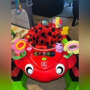 Delta Children 4-in-1 Activity Walker - Rocker, Activity Center, Bouncer, Walker